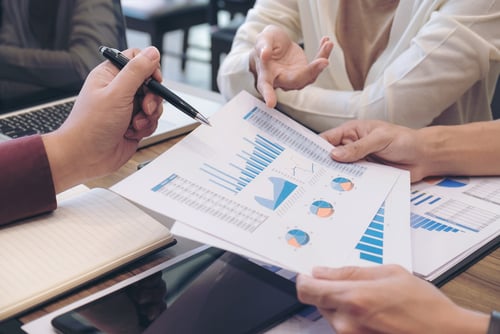 Employers reviewing healthcare benefits data