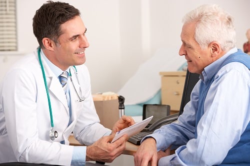 Healthcare providers reviewing patient care